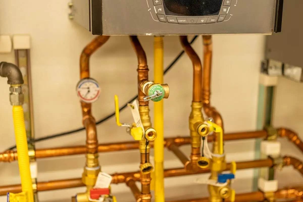 Licensed technician providing Backflow Prevention for a homeowner in Maize